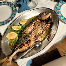 Share local seafood at La Cozza Ubriaca