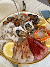 Try the seafood at La Locanda sul Porto