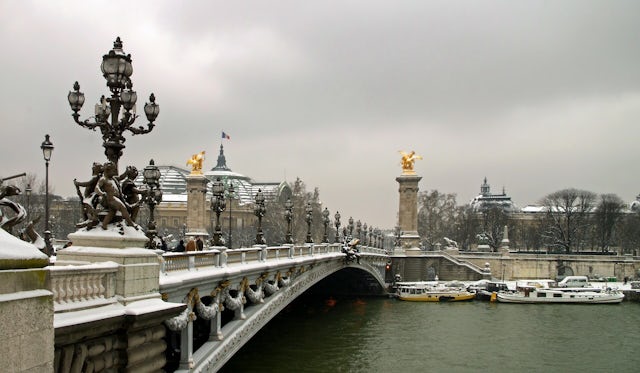Light snow on a bridge across the Seine, Paris