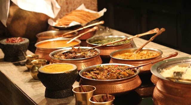 Copper bowls of food