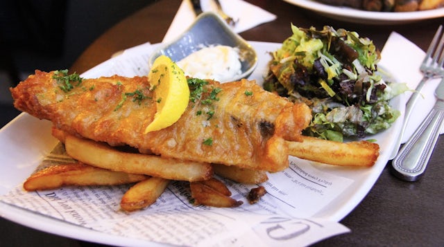 Plate of battered fish and chips
