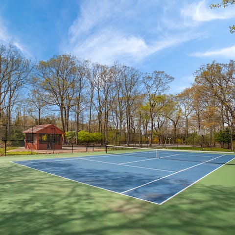 Challenge a fellow guest to a game of tennis on the private court