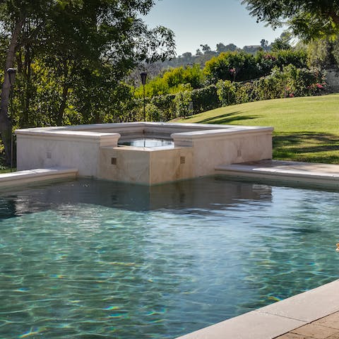 Pick your spot to soak between the pool and the hot tub spa