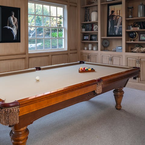 Challenge someone to a game of billiards