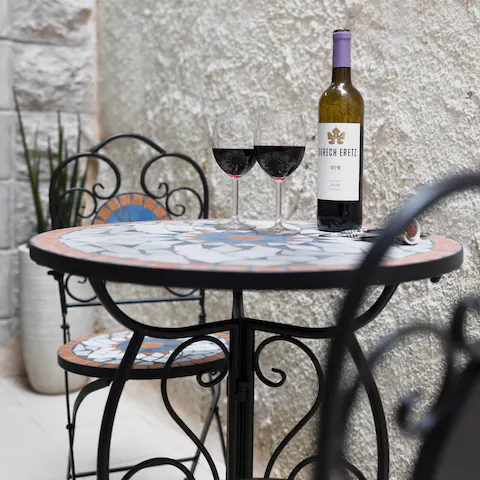 Treat yourself to a glass of wine on the terrace