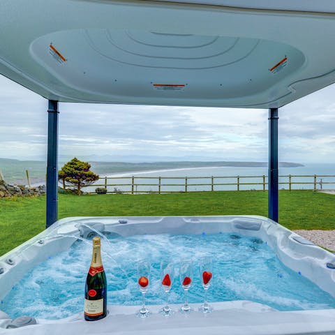 Soak in the luxurious outdoor hot tub