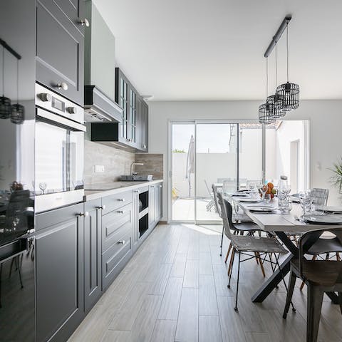 Take food from stovetop to table in this open kitchen and dining space