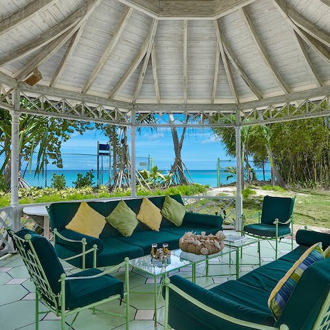 Savour a rum cocktail or two on the cosy gazebo