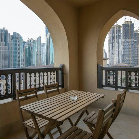Enjoy your morning coffee on the balcony, looking out at the cityscape