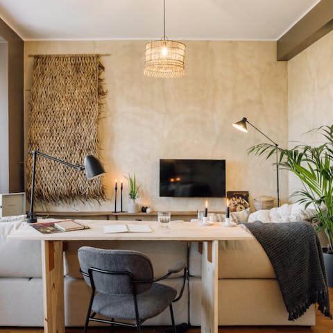 Catch up on work at the living area's desk space