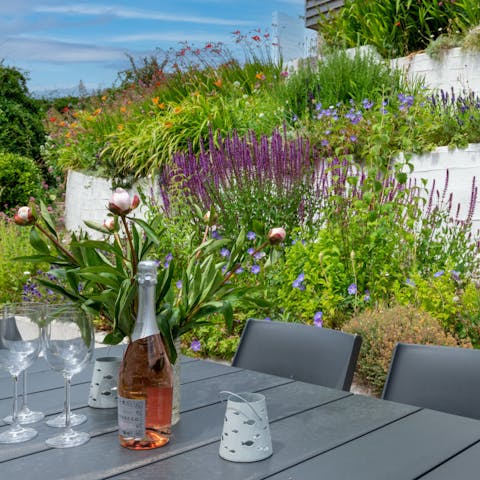 Savour the magic of outdoor living with drinks in the garden