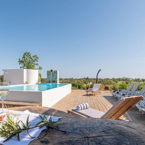 Spend a lazy day lounging by the swimming pool