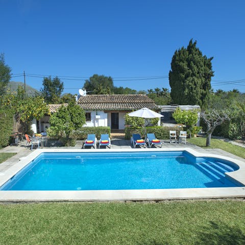 Plunge into the refreshing waters of your pristine pool