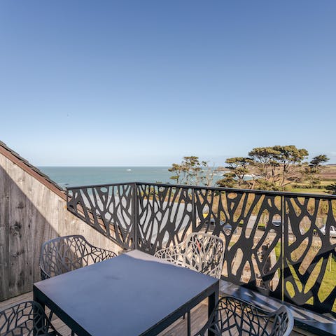 Tuck into breakfast while taking in sea views from the balcony