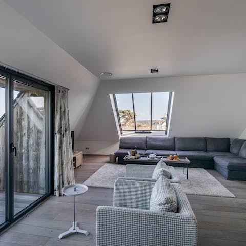 Relax in the stylish living space after a day exploring