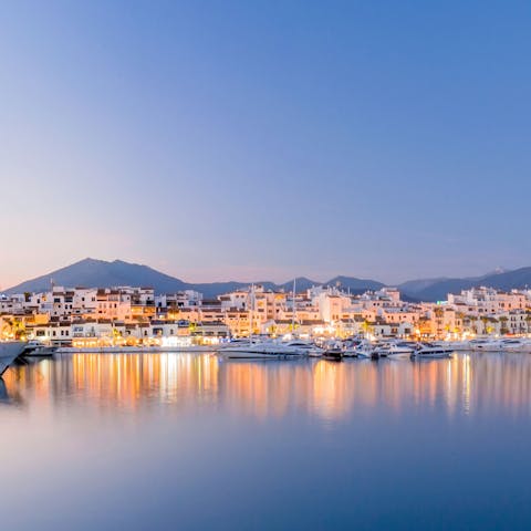 Enjoy a gentle evening stroll along the Marbella promenade and watch the stars fills the sky