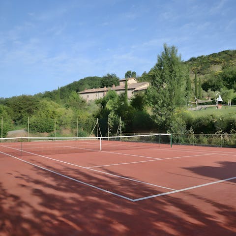 Play a few games of tennis on the communal court