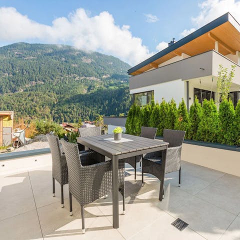 Dine alfresco on the terrace and enjoy breathtaking mountain views
