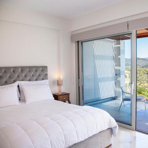 Wake up to gorgeous views and plenty of sunlight in the main bedroom