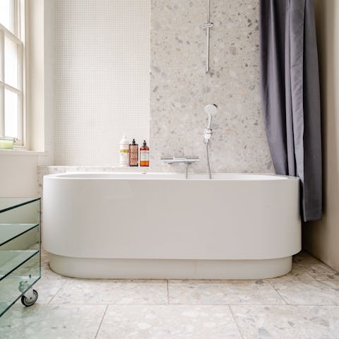 End the evening with a long soak in the en-suite bathtub