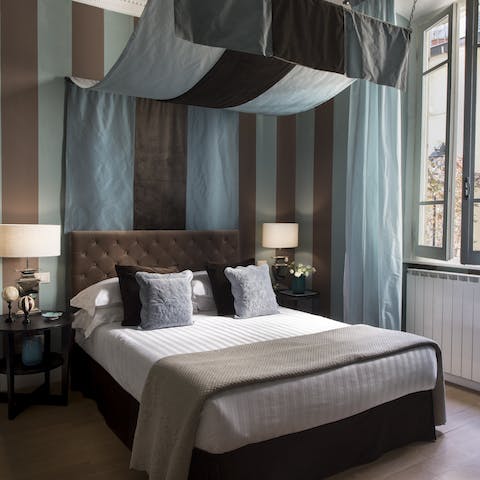Sleep sound in the master bedroom's canopy bed