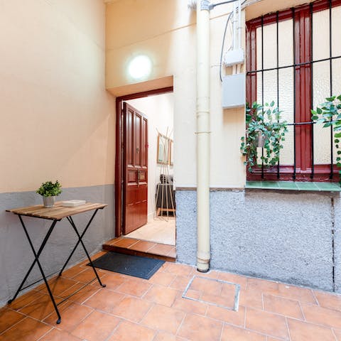 Step into your apartment from the traditional Spanish courtyard