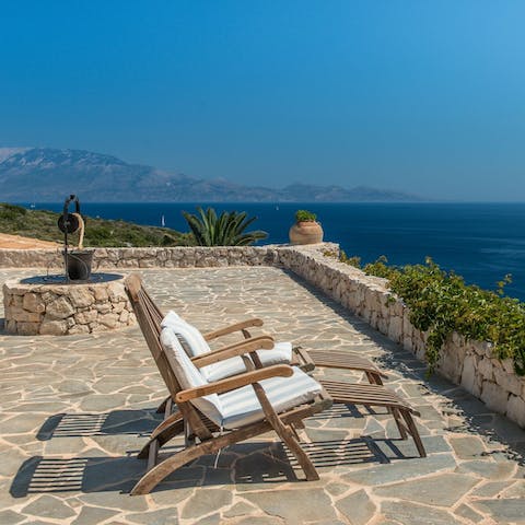 Relax on the sun loungers with a drink, good book and a romantic view