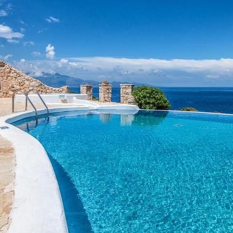 Start your morning with some laps in the private pool overlooking the Ionian Sea