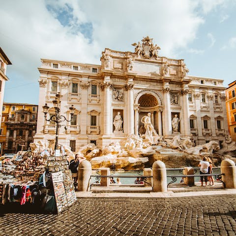 Visit the beloved Trevi Fountain, under a ten-minute stroll away