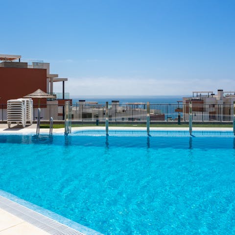 Cool off from the afternoon heat in the shared swimming pool