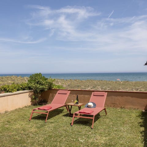 Sunbathe on the small garden overlooking the Mediterranean Sea