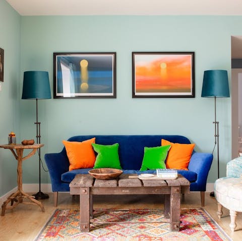 Kick back in living room's colourful setting after a day of discovering the Scottish Highlands