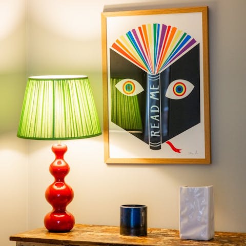 Admire the home's funky collection of artwork 