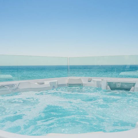 Look out to sea while you relax in the hot tub