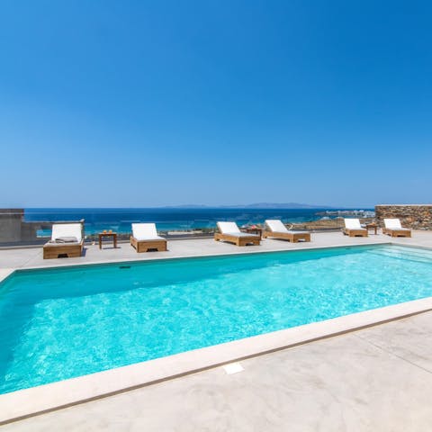 Relax by a communal pool on the sea-facing terrace, great for socialising