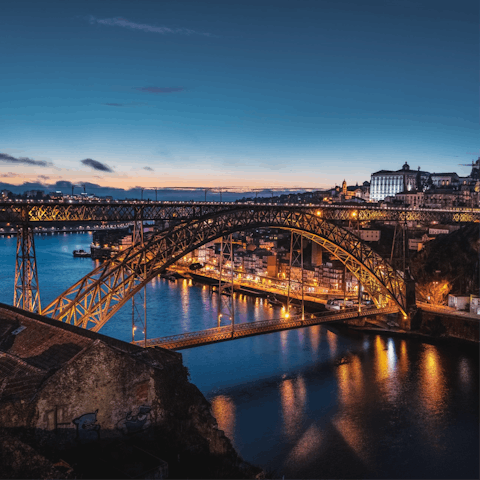 Cross the Dom Luís I Bridge for a visit to the port cellars in Gaia