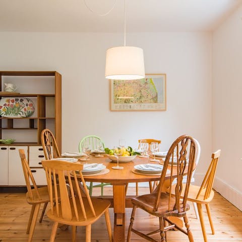 Gather around the country-style table for relaxed dinners, drinks, and board games at home