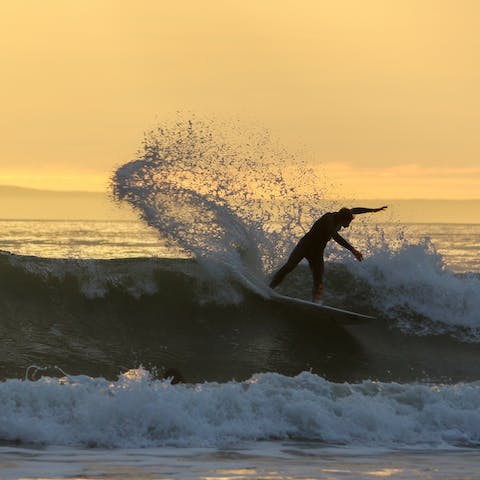 Enjoy sunset surf sessions at Croyde Bay – it's a little over twenty miles away