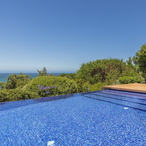 Enjoy daily swims in your stunning infinity pool with sea views 