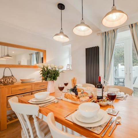 Share memorable family feasts together around the wooden dining table