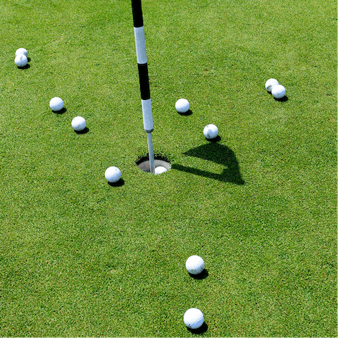 Swing the club and try to score a hole in one
