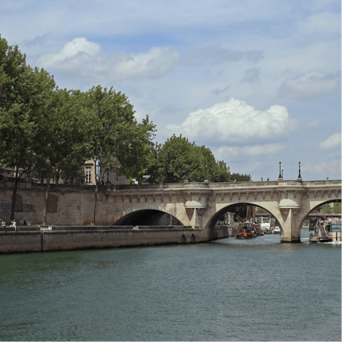 Take a stroll along the atmospheric streets towards the Seine