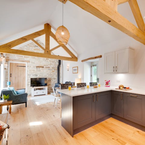 Admire rustic, traditional features like wooden beams and exposed brickwork