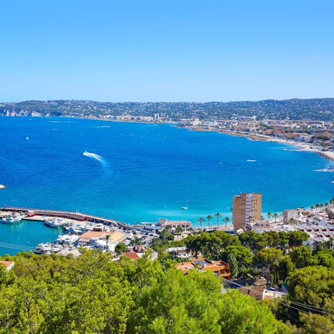 Drive into Jávea, 3km away, and sprawl out on the lively beaches