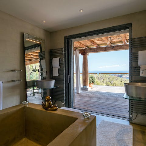 Meditate in the stone bath overlooking the sea