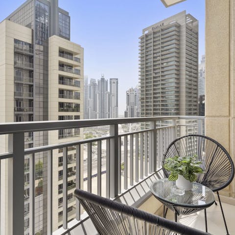 Admire the impressive cityscape from the comfort of your balcony 