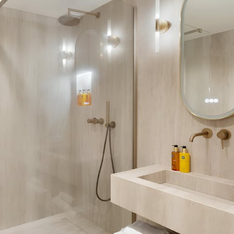 Get ready in the modern bathroom for a night out in the City of Light