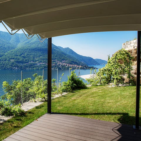 Breathe in on the yoga platform under the pergola