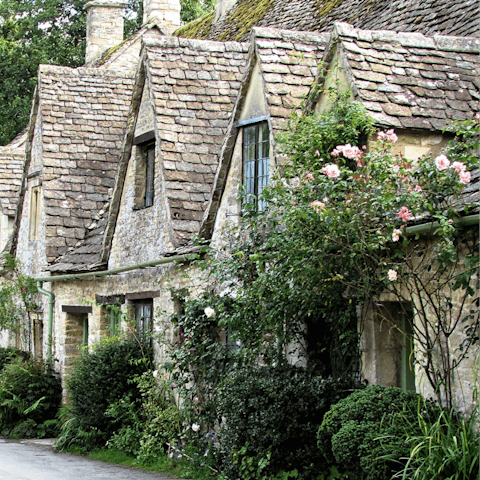 Spend the afternoon in Bibury as you stroll along the River Coln  – an eighteen minute ride away