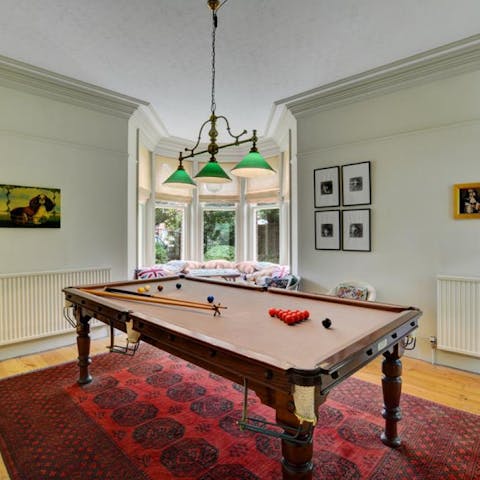 Play a few rounds of pool in the games room